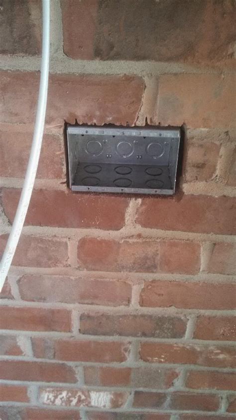 electrician talk brick wall